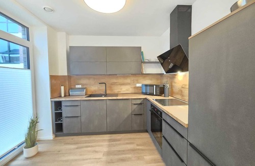 Suderneuland I Apartment | Meeresrauschen - vacation with terrace, sauna & garden at the Norder Marina