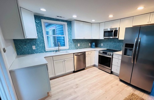 Chincoteague House | Mermaid & Mare, Downtown Retreat. Hot Tub, Firepit, fenced yard & Pet Friendly!