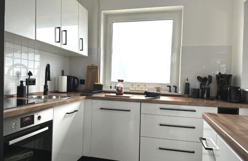 Schloss Holte-Stukenbrock Apartment | Mid - Century
