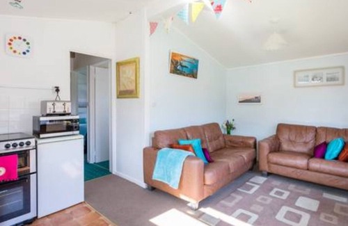Llanybri Ski Chalet | Milkwood, A lovely Three-bedroomed chalet, sleeps five