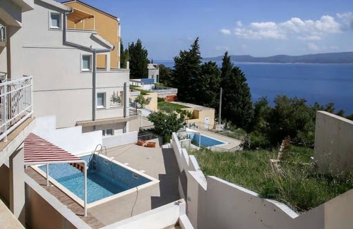 Mimice Apartment | Mimicetraum vacation complex with swimming pool, dog welcome, sea view