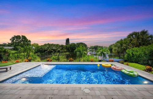Jensen Beach House | Mini Golf Course*Heated Saltwater Pool*Lakeview!