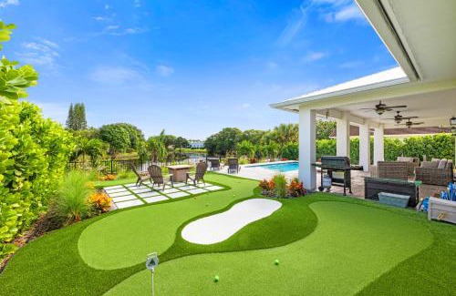 Jensen Beach House | Mini Golf Course*Heated Saltwater Pool*Lakeview!