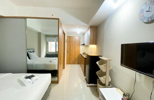 Duren Sawit Apartment | Minimalist Studio Room Gateway Park LRT City Jatibening Apartment By Travelio
