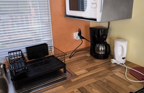 Ascarat RV Rental | Mobile Home 'Mobile-home Camping De La Truite' with Mountain View, Private Terrace and Wi-Fi
