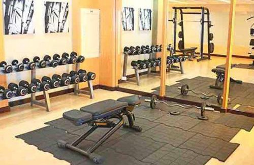 Wack-Wack Greenhills Villa | Modern 1BD Executive Suite, Netflix Wifi Pool Gym