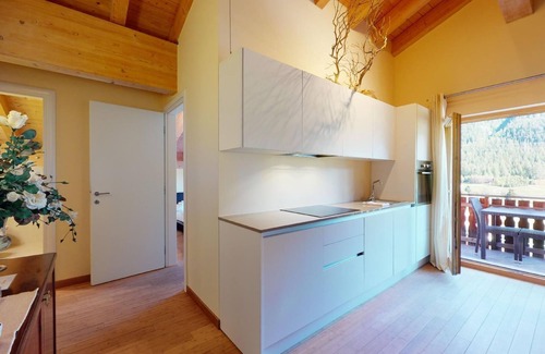 Madulain Apartment | Modern 3½ room flat on the ground floor, approx.