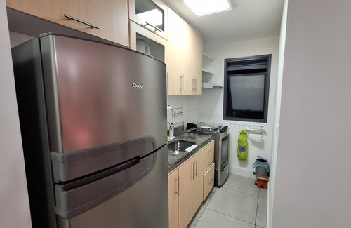 Lapa Apartment | Modern apartment with its own small backyard and swimming pool