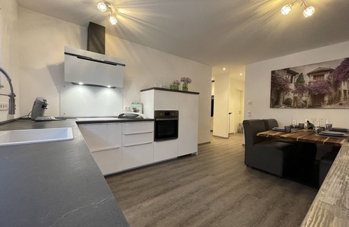 Losheim am See Apartment | Modern and centrally located holiday apartment with a large balcony.