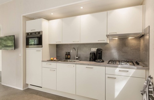 Ockenburgh Ski Chalet | Modern and luxurious chalet with dishwasher near the beach