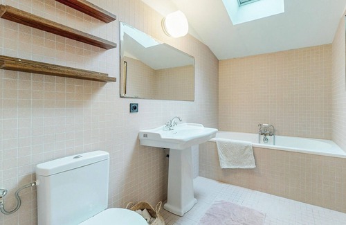 Vieux-Pont House | Modern and practical wooden house with large terrace and natural garden.