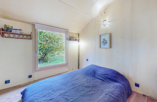 Vieux-Pont House | Modern and practical wooden house with large terrace and natural garden.