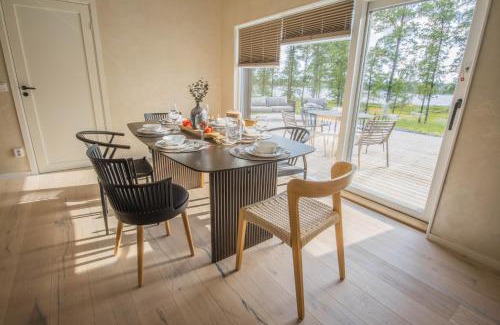 Ryssby Villa | Modern boende med sjöutsikt