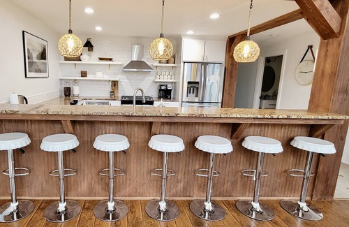 Paw Paw Lake House | Modern cottage w/sauna, fire pit, outdoor dining, pool table, & sunroom