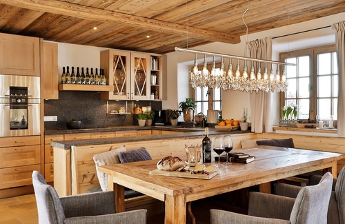 Frasdorf Apartment | Modern chalet style with private sauna, fireplace, hot tube, pool with Chiemsee view