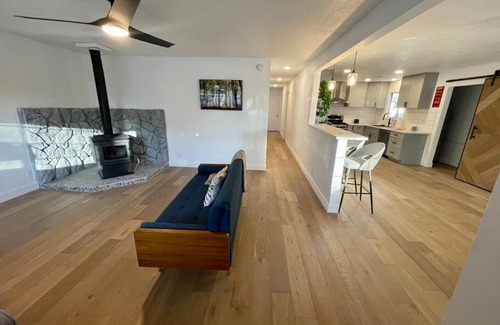 Flagstaff House | Modern Chic 4-Bedroom Home with Wood Stove Fireplace