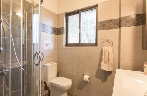 Legrena Apartment | Modern Condo at the Beach