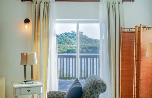 Venetian Road Settlement Villa | Modern Flamingo Lake Villa