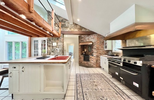 Redding Ridge House | modern home with a pool