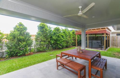 Trinity Beach House | Modern Home with Private Spa and Fenced Garden