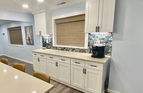 Conneaut House | Modern Lake Home in Private setting with Lake Access and Hot Tub
