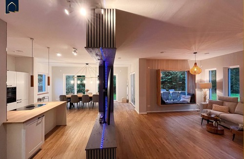 Usedom House | Modern natural idyll: Spacious vacation home near the Karnin lift bridge for 10 guests.