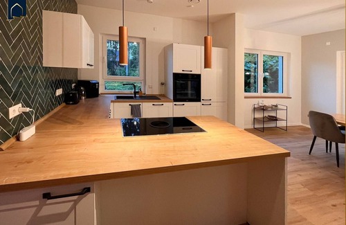 Usedom House | Modern natural idyll: Spacious vacation home near the Karnin lift bridge for 10 guests.