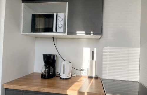 Itainen District Apartment | Modern new studio with private parking, near metro