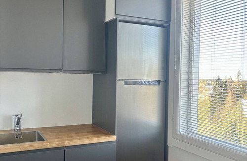 Itainen District Apartment | Modern new studio with private parking, near metro