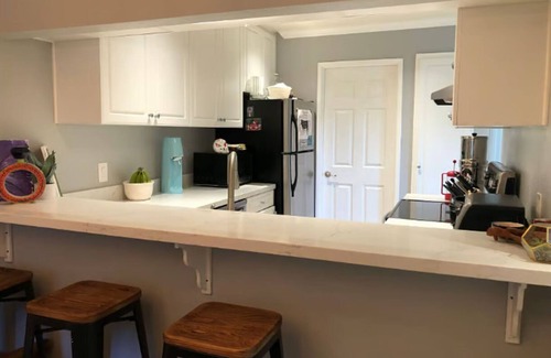 Sequoyah Condo | Modern, Peaceful Condo in Shadow Woods - Gated community with parking, gym, pool