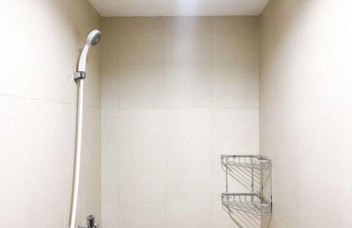 Duren Sawit Apartment | Modern Studio at Gateway Park LRT City Jatibening Apartment By Travelio