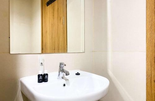 Duren Sawit Apartment | Modern Studio at Gateway Park LRT City Jatibening Apartment By Travelio