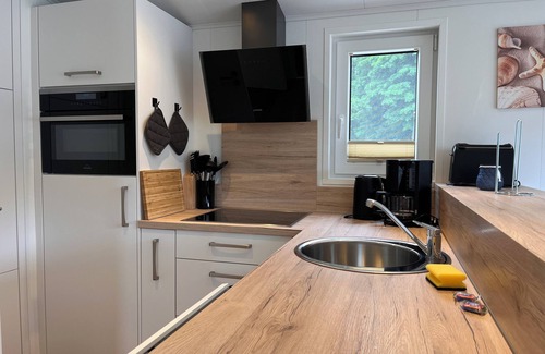 Gronenberg House | Modern vacation home "Sturmfrei" m Ostseecamp - ideal for family vacations