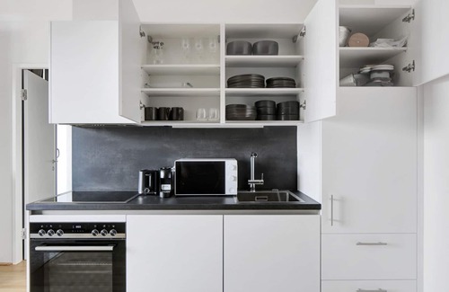 Favoriten Apartment | Modern Wieden 1BR w/Balcony, Gym, Elevator, walk to U-Bahn, by Blueground