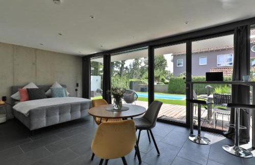 Gersthofen Apartment | Modernes Studio-Apartment - Gartenblick
