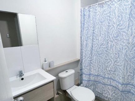 Coronel Apartment | Moderno departamento con WiFi, y estacionamiento en Coronel