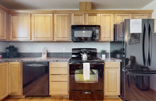 Ronald Condo | Mountain view condo with balcony, fireplace, pool, hot tub, gym & tennis