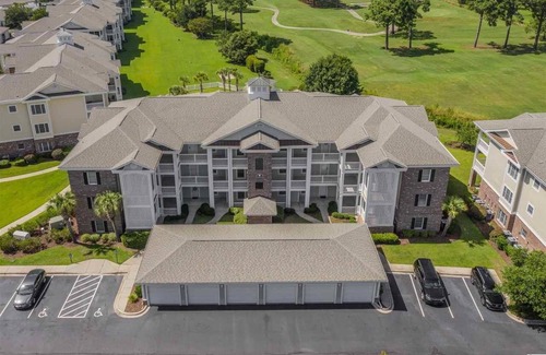 Central Myrtle Beach Condo | Myrtlewood 2-bedroom condo accepting pets. Pool in the backyard