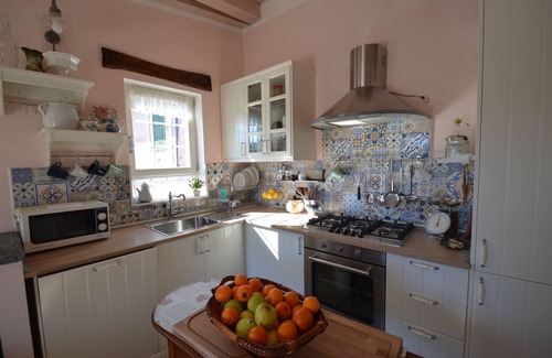 Costiolo House | Natural stone house in panoramic position with sunny terrace and garden