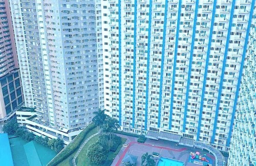 Highway Hills Condo | NEW! 1BR Condo Unit: Linked to Mall & Train Station, Wifi, 55" TV, Pool View