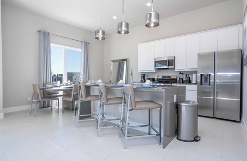 Reunion Apartment | New 5BR Stylish Duplex – Modern Comfort Just Minutes from Disney!