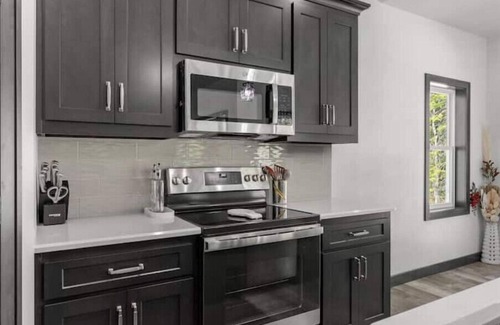 Jacksonport House | New, charming custom home, 7 minute walk to the beach