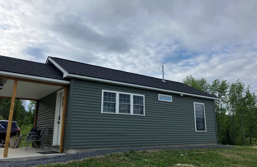 Oakland Cabin | NEW Cozy Cabin located in Oakland tucked away in a peaceful wooded scene.