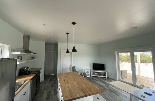 William's Town House | New two bedroom home only steps from Tropic of Cancer Beach in Little Exuma