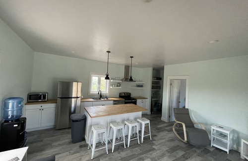 William's Town House | New two bedroom home only steps from Tropic of Cancer Beach in Little Exuma