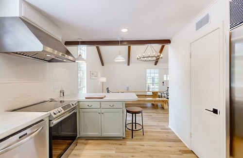 Brookeland House | Newly-remodeled & fresh dog-friendly hideaway with treetop views & firepit