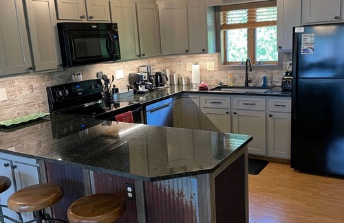 Fraser House | Newly Updated, Spacious 2 Bedroom + Bunk Room Condo with new modern kitchen