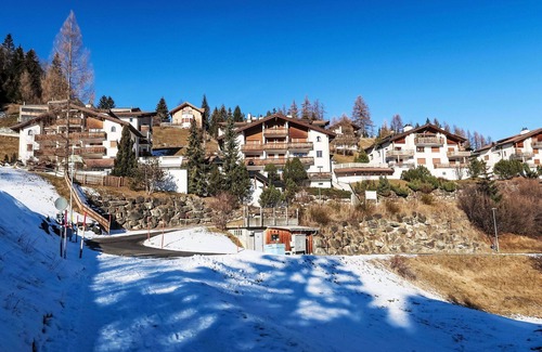 Grisons Apartment | Nice apartment with WIFI, pool, TV, balcony, pets allowed, panoramic view and parking
