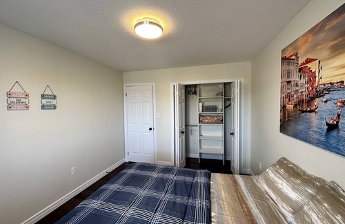 Grand River South House | Nice home with cozy living room, large backyard, bedroom and bathroom.