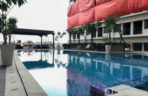 Duren Sawit Apartment | Nice Studio at Gateway Park LRT City Jatibening Apartment By Travelio